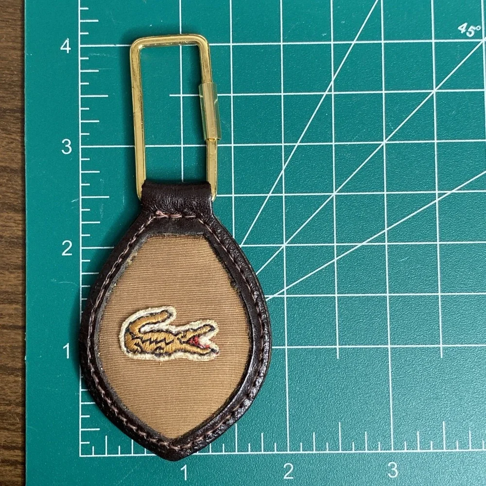 Vintage Lacoste Mixed Material Keychain Leather Brass tone